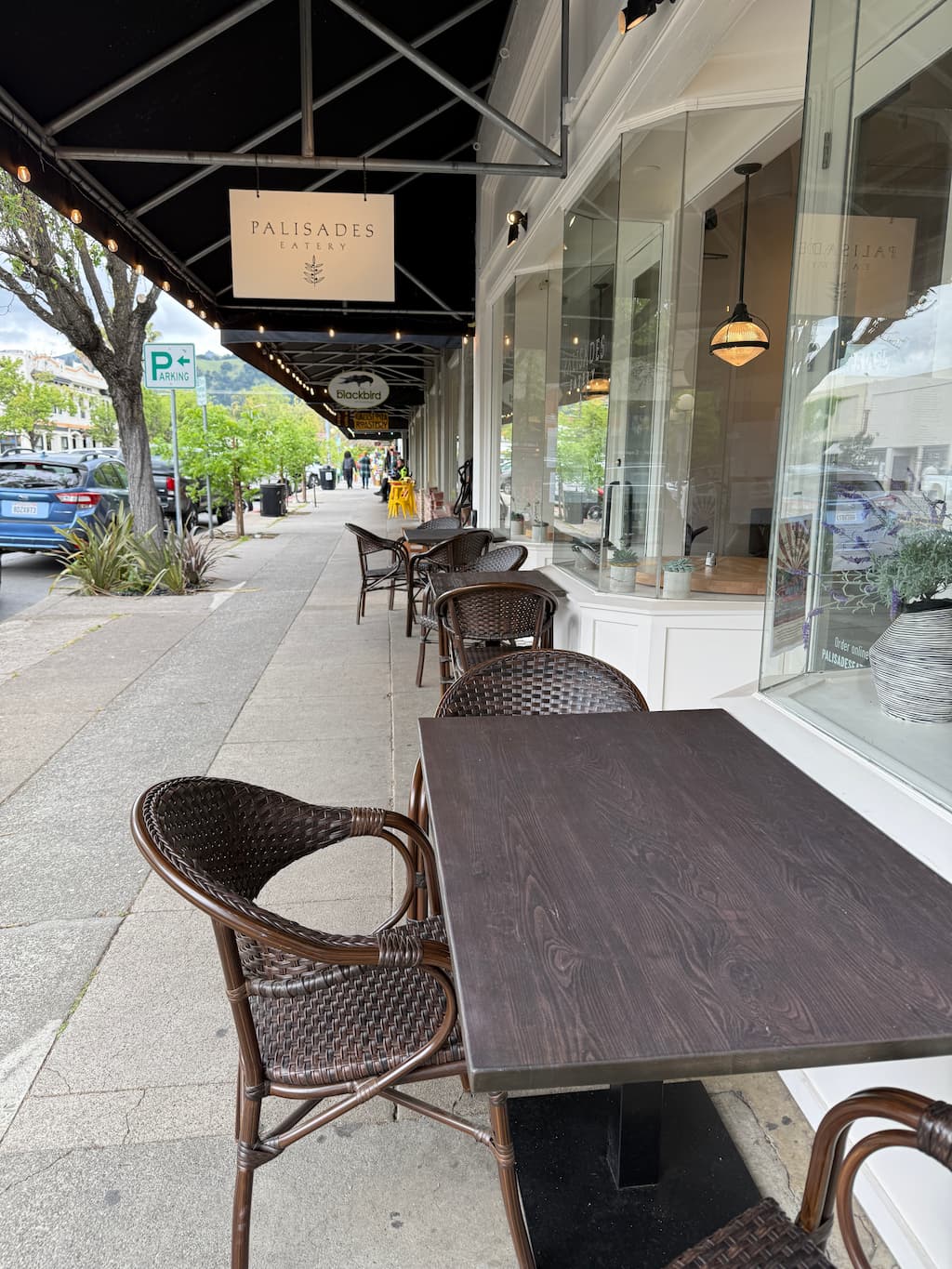 Empty patio tables on the sidewalks of downtown Calistoga