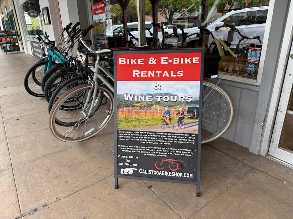 A sign for bike and ebike rentals at a Calistoga bike shop