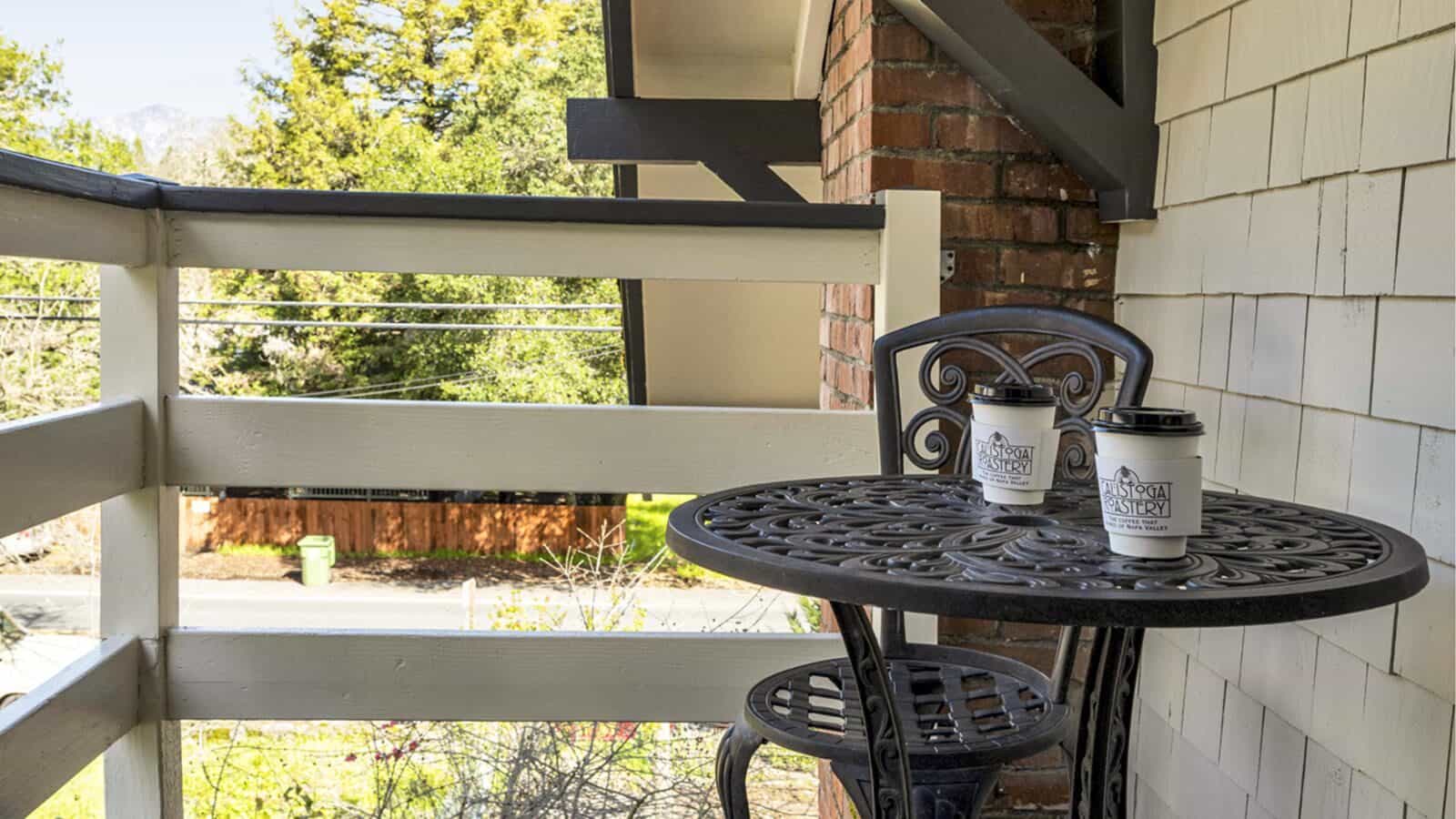 Close up view of metal patio chair and table on a balcony
