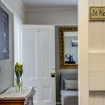 Close up view into bedroom with a sign that says St Helena