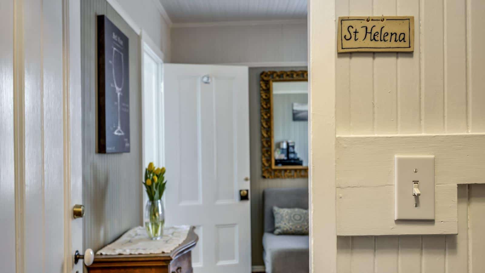 Close up view into bedroom with a sign that says St Helena